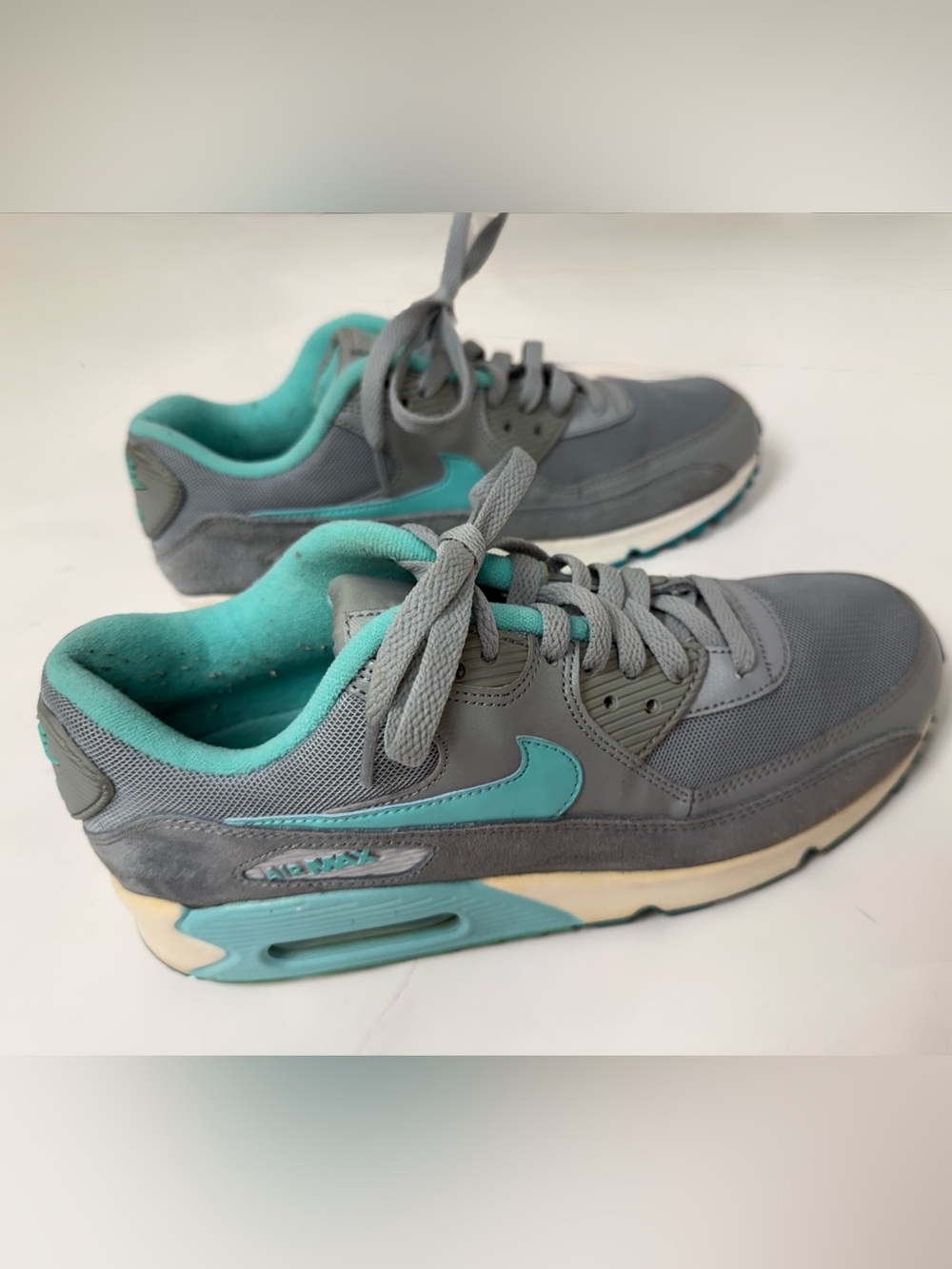 Nike Gray Sneakers with Teal Swoosh